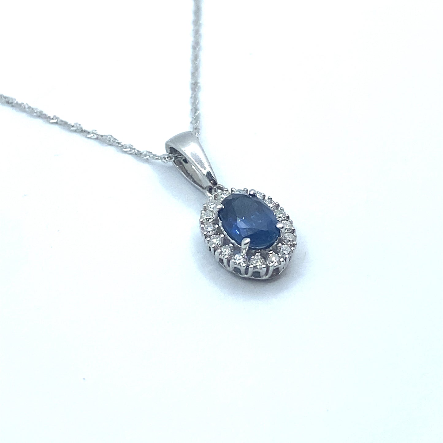 Oval Sapphire & Diamond Halo, 18ct White Gold Pendant