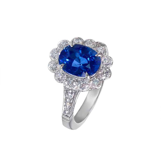 Oval Sapphire & Diamond Cluster Ring in Platinum