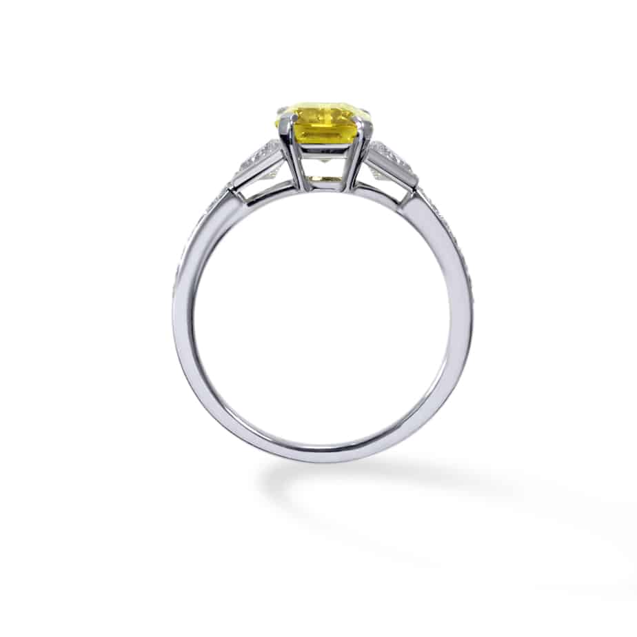 Emerald Cut Yellow Sapphire and Trapeze Cut Diamond 3 Stone Ring in Platinum