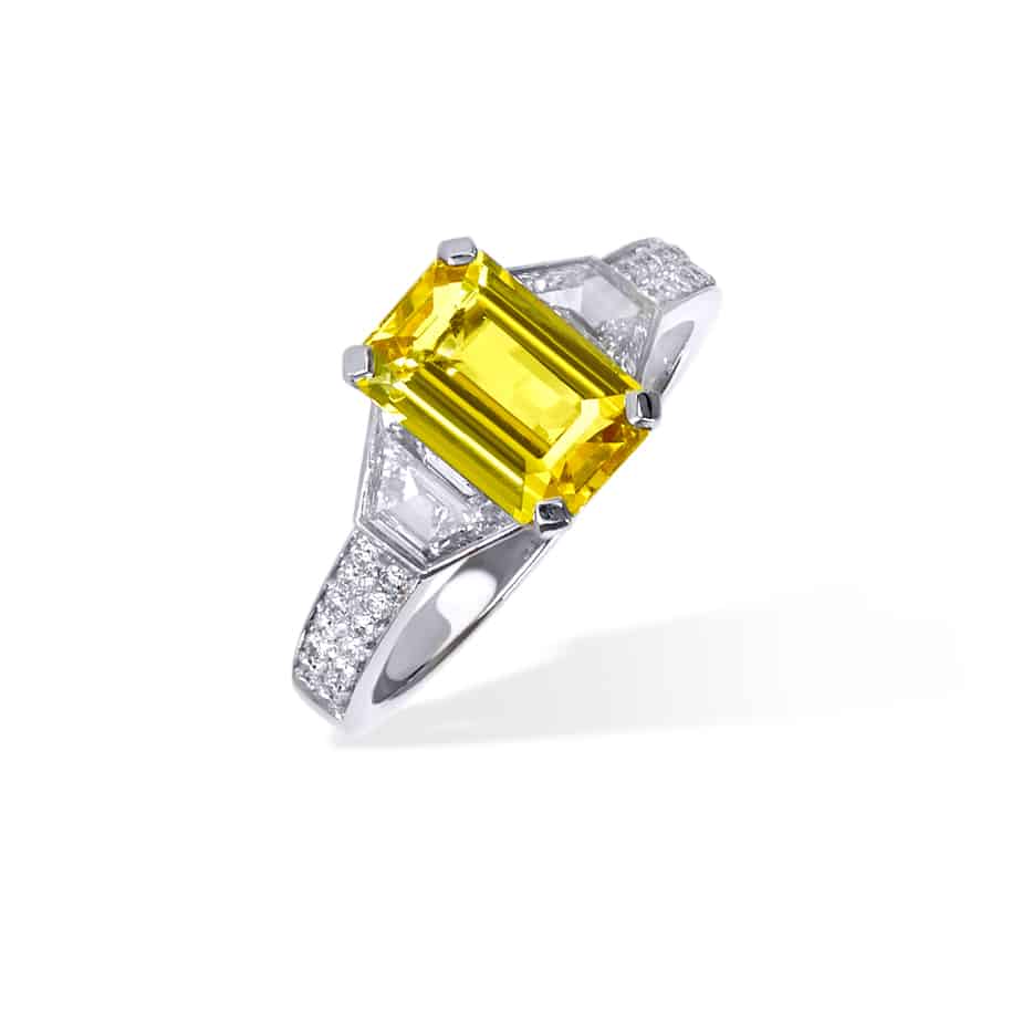 Emerald Cut Yellow Sapphire and Trapeze Cut Diamond 3 Stone Ring in Platinum